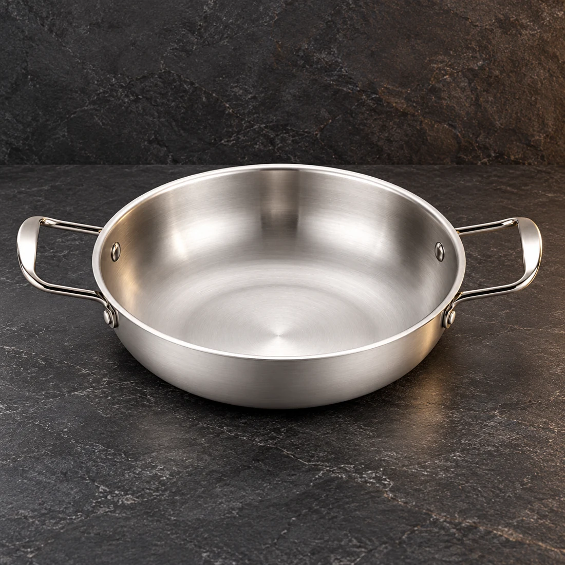 Silver-tone shallow serving pan with two loop handles